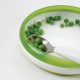 Babero enrollable verde con cuchara